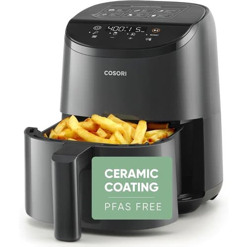Cosori 2L small air fryer in matt black with chips in the basket