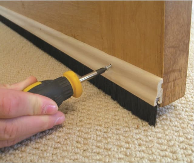 Stormguard natural wood brush bottom door seal for timber doors