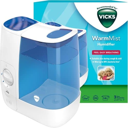 Vicks blue and white warm mist humidifier next to its box