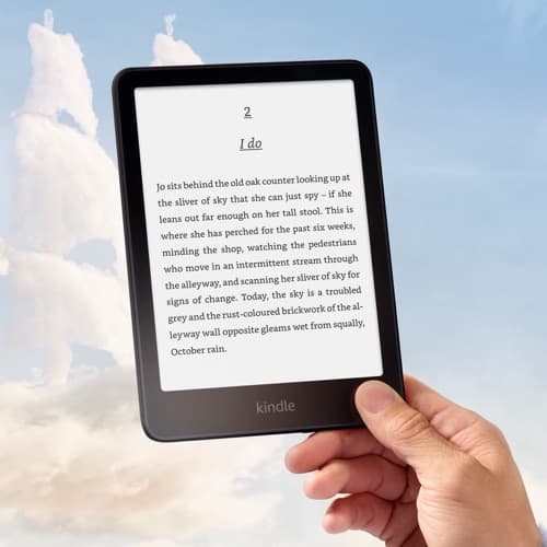 Hand holding an Amazon Kindle Paperwhite Signature Edition