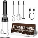 Typhur black handheld milk frother on its stand with three whisk heads