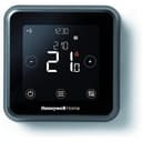 Black Honeywell Home T6 touchscreen smart thermostat on a wall