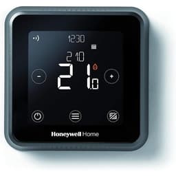 Black Honeywell Home T6 touchscreen smart thermostat on a wall