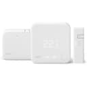 White tado V3+ smart thermostat with wireless receiver