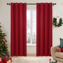 Deconovo red thermal eyelet blackout curtains hanging on a pole