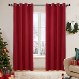 Deconovo red thermal eyelet blackout curtains hanging on a pole