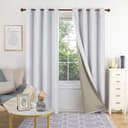 Deconovo pale grey faux linen blackout curtains with coated back shown at the window