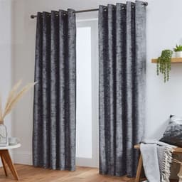 John Aird dark grey crushed velvet lined eyelet curtains in a bright room