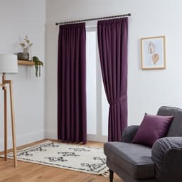 John Aird aubergine thermal blackout pencil pleat curtains with tiebacks in a living room