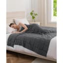 Grey Good Nite 8kg weighted blanket on a double bed